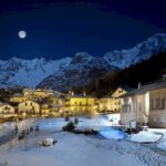 Vista panoramica di terme italiane, con piscine termali e natura circostante, simbolo di relax e benessere.
